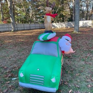Gemmy Inflatable Car With Santa And Surfing Reindeer
